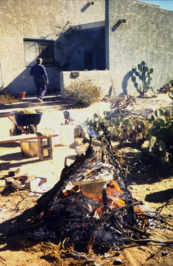 a homemade kiln on an open fire